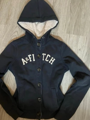 Abercrombie & Fitch Blue Button-Up Hoodie - - In good condition, hood string is missing, size EU 36 / S