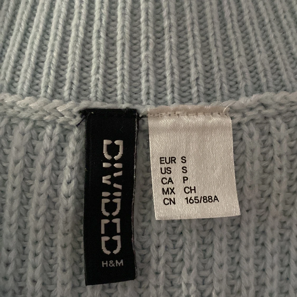 Ljusblå stickad väst från H&M - 1