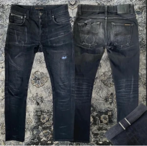 Nuddie selvage jeans - Sjukt feta Nudie selvedge jeans i modellen Grim tim och storlek 30/32, men passar nog mer som 29/31, se mått 🙌 Jeanssen har redan börjat få snygga tecken på användning men kommer bara bli snyggare över tid, skriv vid fråga 🤙 Midjemått 38 cm, ytterbenslängd 100 cm