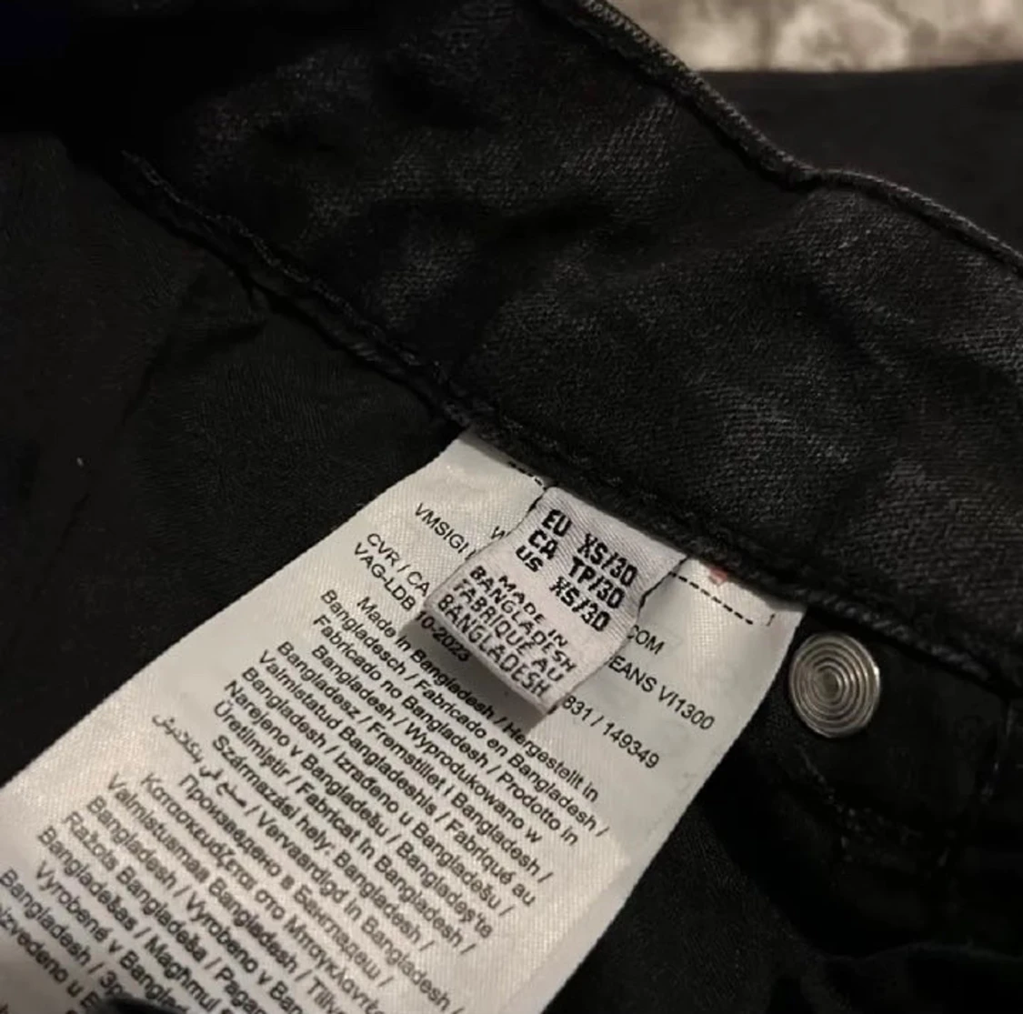 Svarta lågmidjade bootcut jeans från Vero Moda - 6