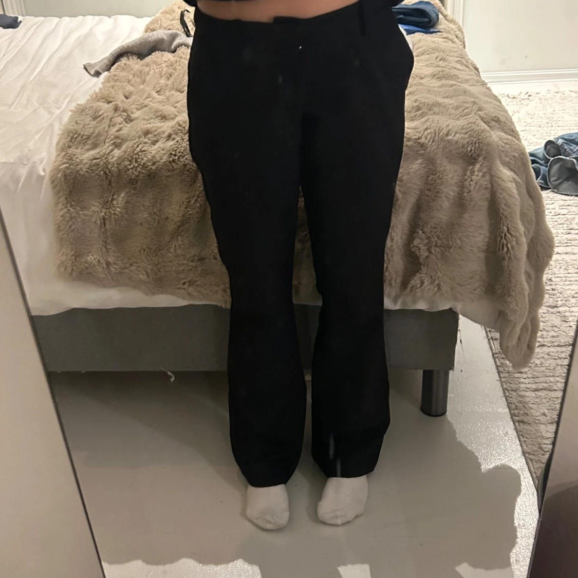 Svarta kostymbyxor med raka ben