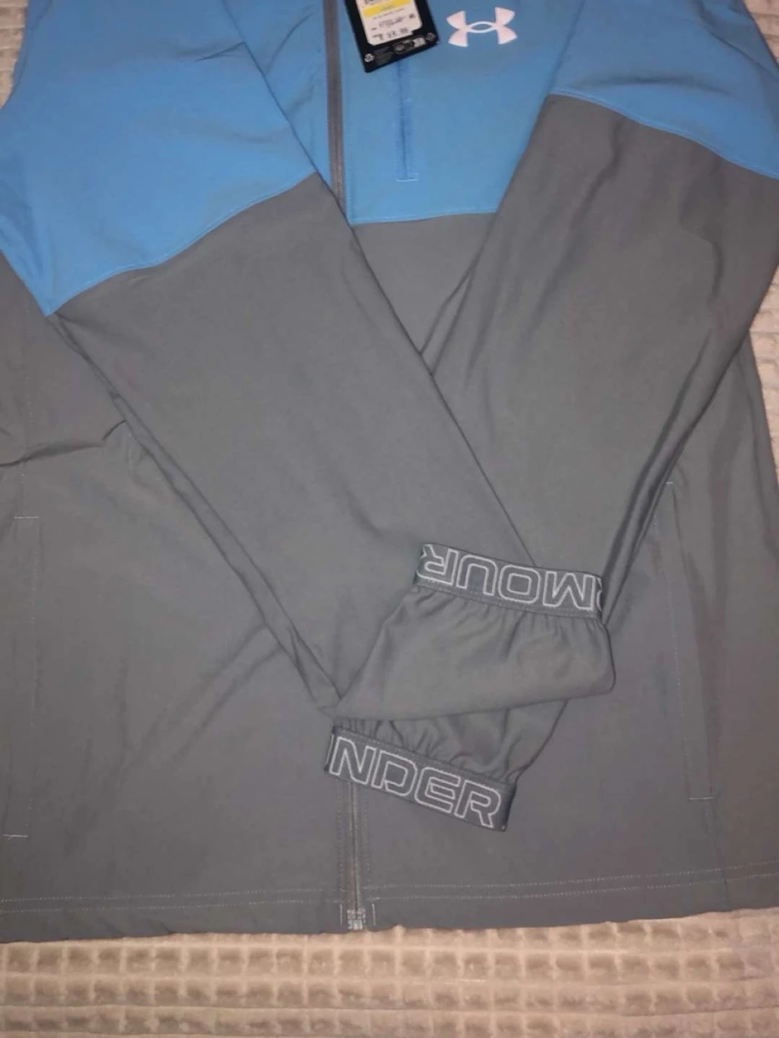 Under armour vindjacka 