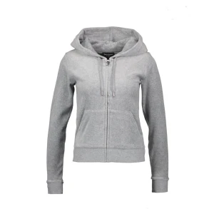 Grå Juicy Couture Kofta, storlek S - Grå kofta från Juicy Couture. Klassisk modell med huva, dragkedja med snyggt J-hänge, broderad logga på bröstet och känguruficka. Ordinarie pris 1299kr.