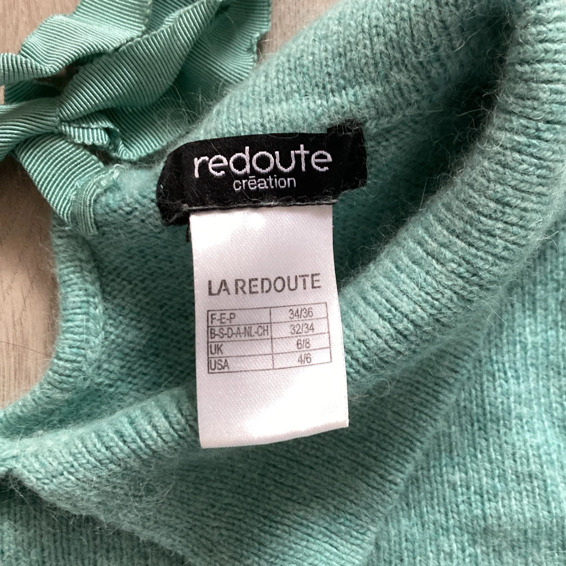 Tröja med knytbar rosett  - 92