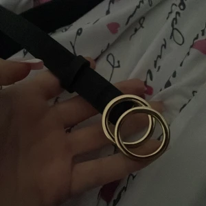 Bälte  - En litet bälte aldrig användt passar alla