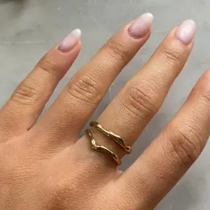 Adjustable gold plated rings from Pilgrim 