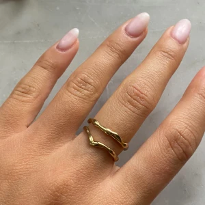 Gold rings - Adjustable gold plated rings from Pilgrim 