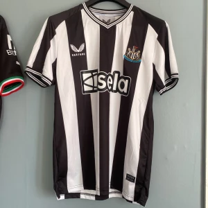 Newcastle tröja - Storlek M, oanvänd