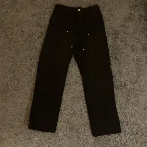 Carhartt svarta jeans 