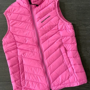 Dunväst Peak Performance XS - Använd nån enstaka gång, som ny!  Storlek XS. Nypris 2000:-