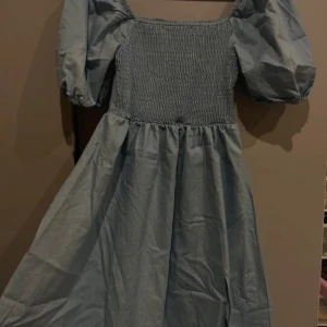 Klänning  - En blå klänning 