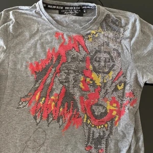 Philipp plein t-shirts  - Snygg Philipp plein tshirt med glittrig varg knappt använd M men passar S 