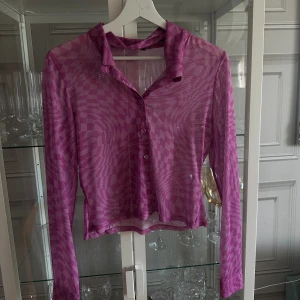 Mesh tröja - Lila rutig mech skjorta ifrån H&M