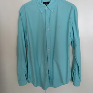 Ralph Lauren skjortor - 3 st i olika färger den orangea är tunnare alla i storlek L. 300 :- / st eller kompispris för alla. 