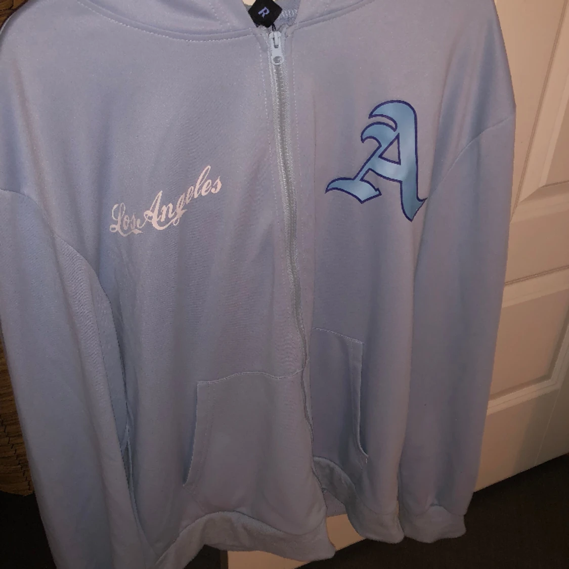 Blå LA ziphoodie  - 90