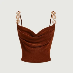 Oanvänd draperad topp från shein i strl M - Säljer denna oanvända topp från shein i strl M. Funkar även som en s. Den är draperad och man kan justera banden.  Undrar man över något så är det bara att kontakta mig.