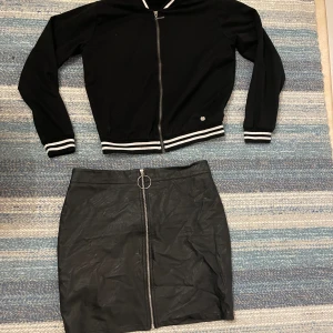 Tröja & skinnkjol  - Båda fint skick!  50kr/st