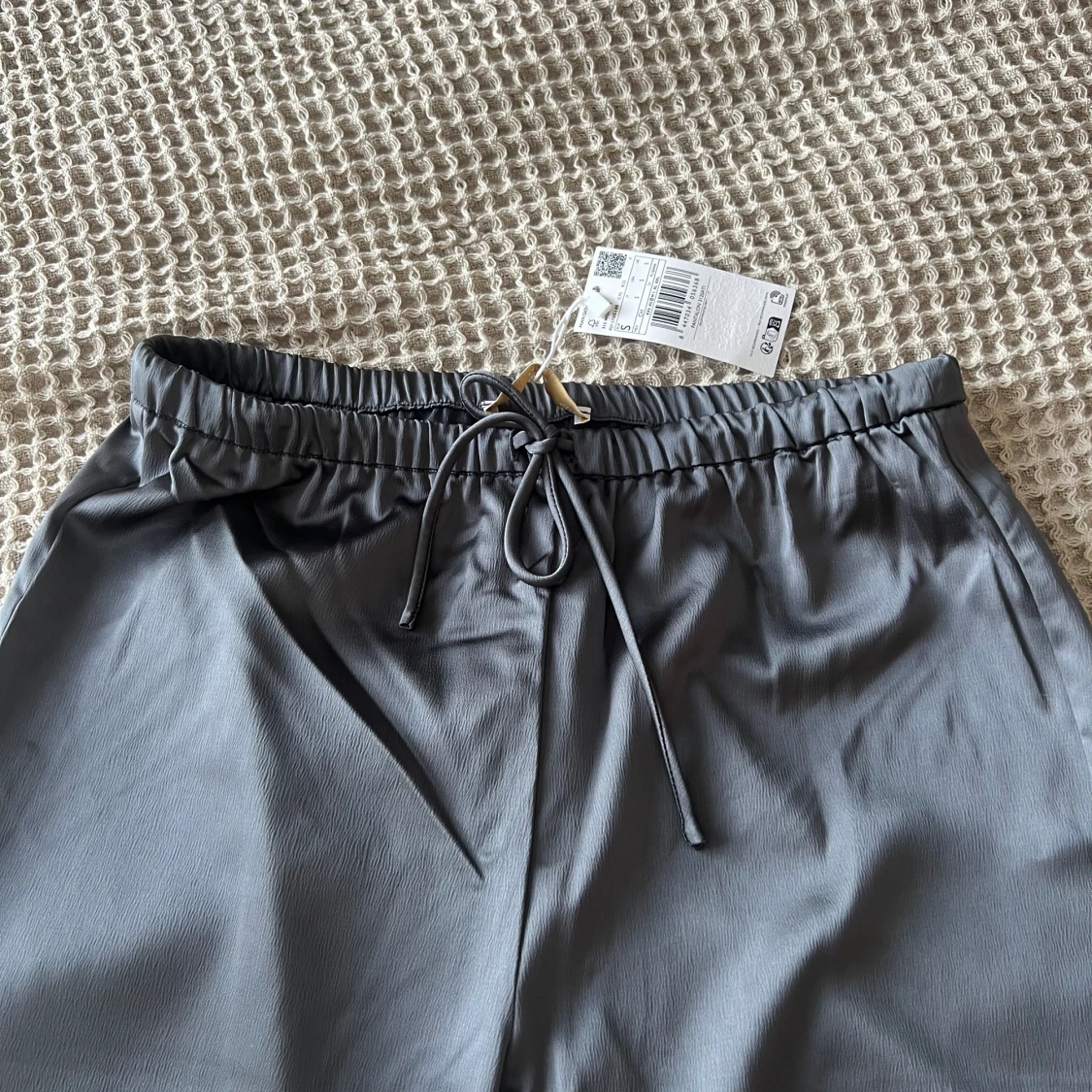 Grå byxor  - 91