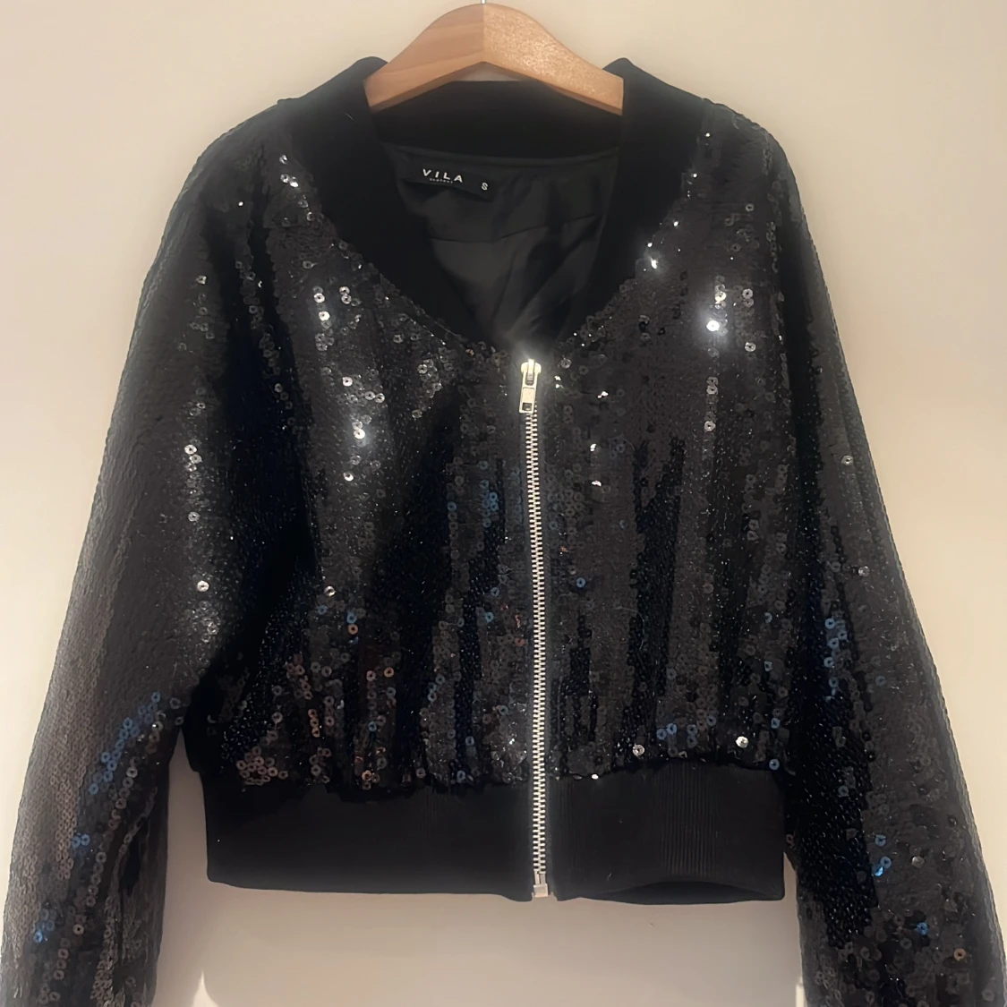 Glittrig minijacka
