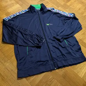 Otroligt sällsynt Asics Zip-tröja från 80/90-tal. Tillverkad i Italien.