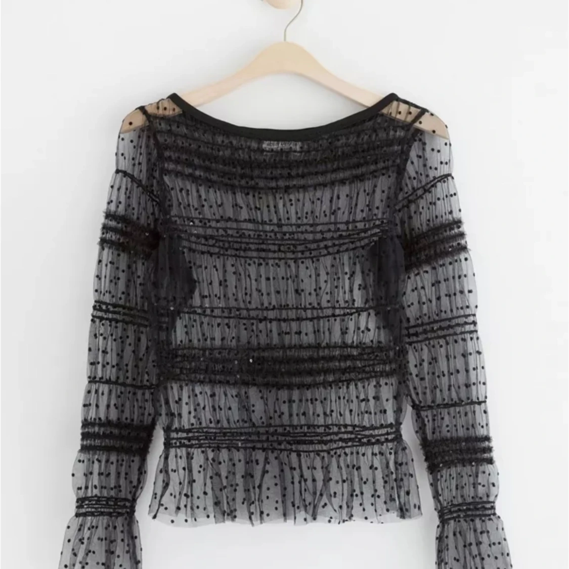 Långärmad topp i mesh 