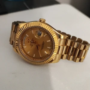 41mm Guld Rolex  - 41mm utan rolex märket på länken.