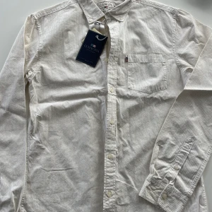 Lexington - Skorta Lexington Ny aldrig använd.