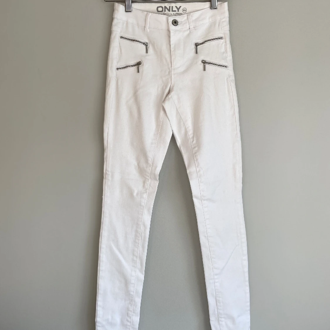 REG SKINNY ZIP JEANS