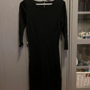 Klänning Saint Tropez - Figurnära klänning i nyskick 