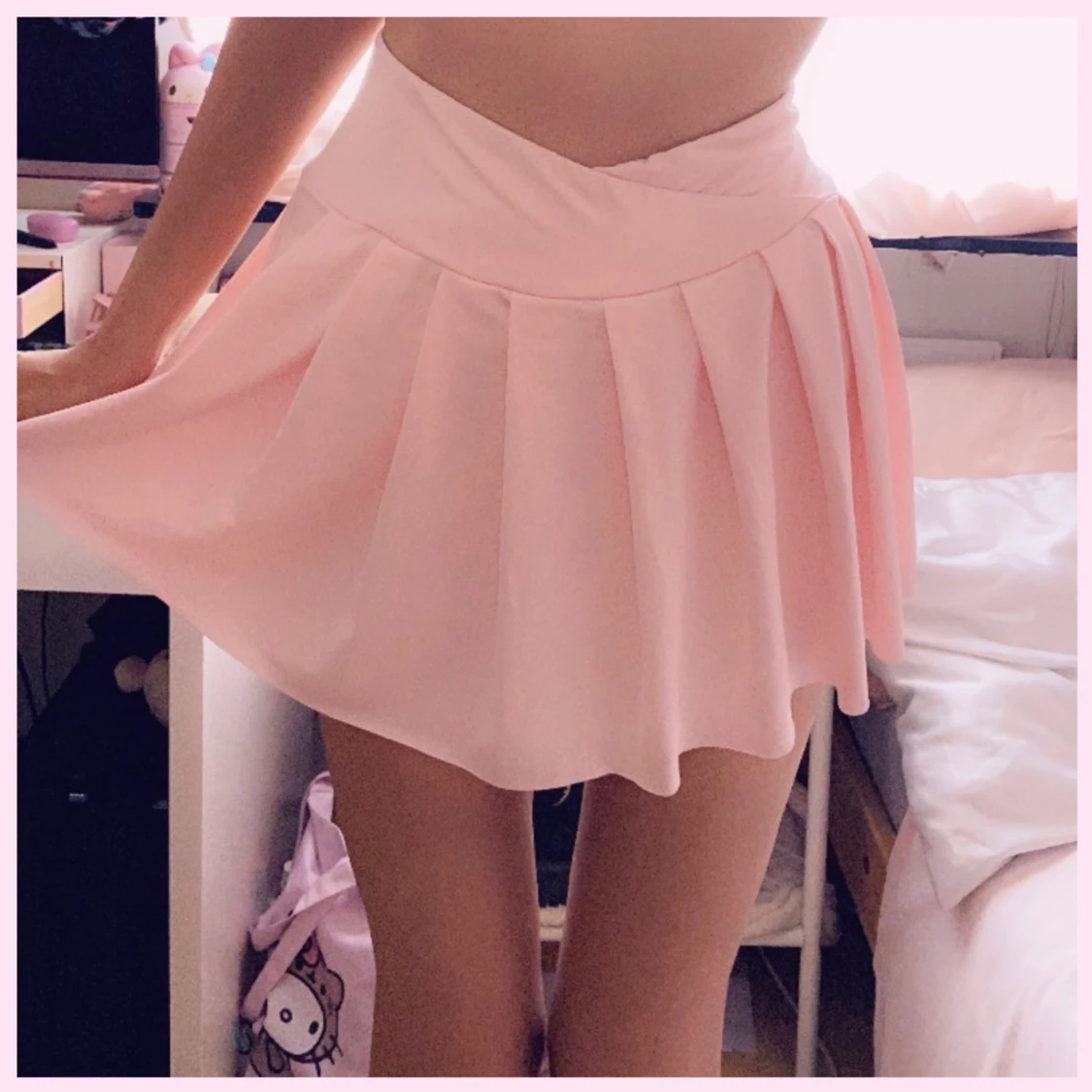 Rosa kjol med inbyggda shorts