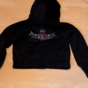 Juicy Couture Hoodie  - Bought this hoodie with the pants also only wore once I payed 1350 for this and they don’t sell it anymore I want to sell as soon as possible thier is no damage on this no gems gone or anything it’s in perfect condition if interested text me please 