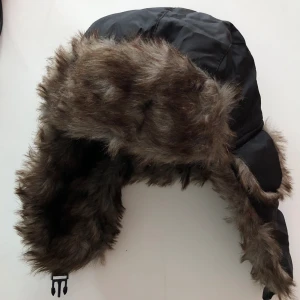 Svart lappmössa - Snygg lappmössa, oanvänd.