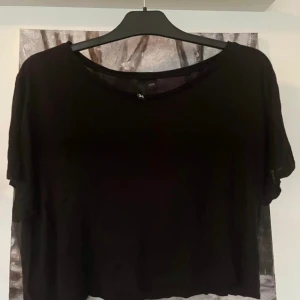 Oversized t-shirt - Kort modell. Tunnare material. 