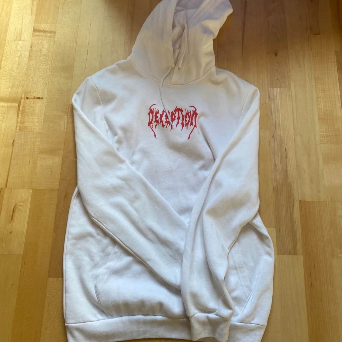 Vit huddie med tryck - 90