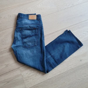 Nudie Jeans - Vintage nudie jeans i skön tvätt. Inga skador, passar W32L30.