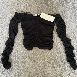 Topp - Topp, of sholder