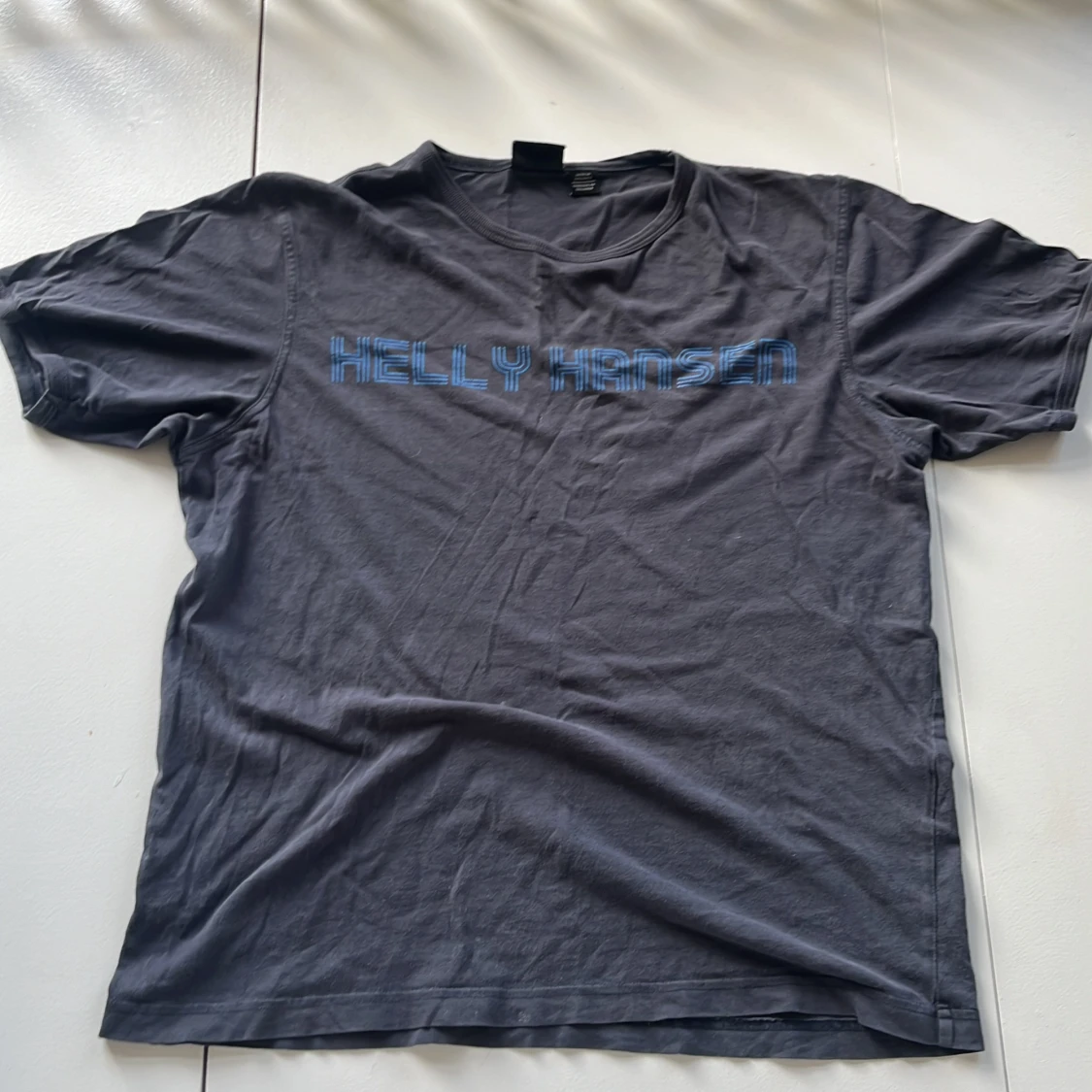 Helly Hansen tisha mörkblå