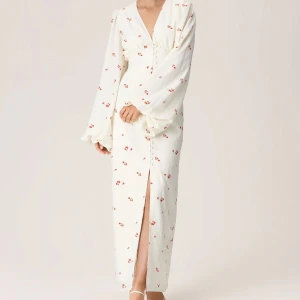 Adoore positano klänning - Helt slutsåld!! Storlek 40 (liten i storleken) är egentligen 38 Fint skick!