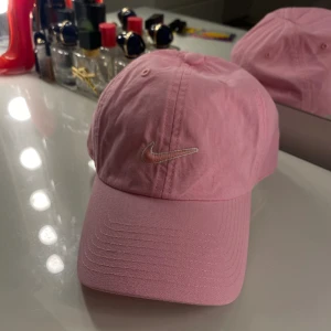 Rosa Nike Keps - så fin! använd endast i somras ett fåtal gånger