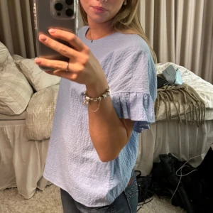 Ljusblå blus - Super fin ljusblå blus från gina tricot!