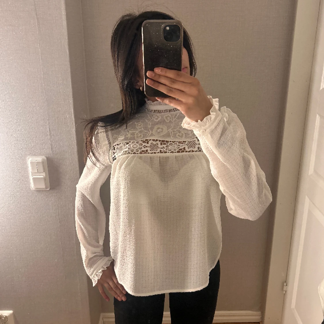 Vit genomskinlig blus