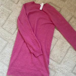 Tygklänning - Rosa tygklänning från Lindex.