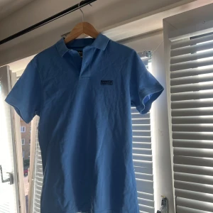 Piké - Fin blå Barbour Pike, inte använd.