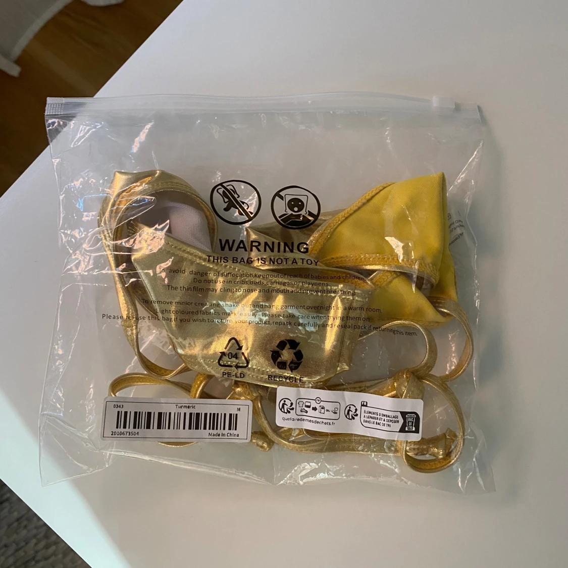 Bikiniunderdel guld  - 93