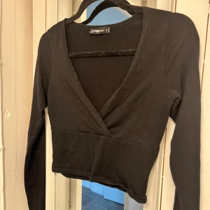 Topp - Jättefin topp med v-ringning 