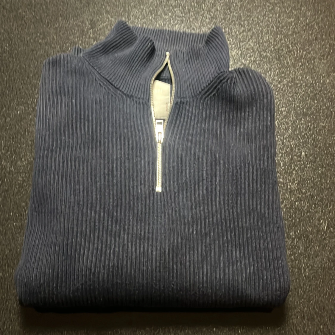 Stickad half zip