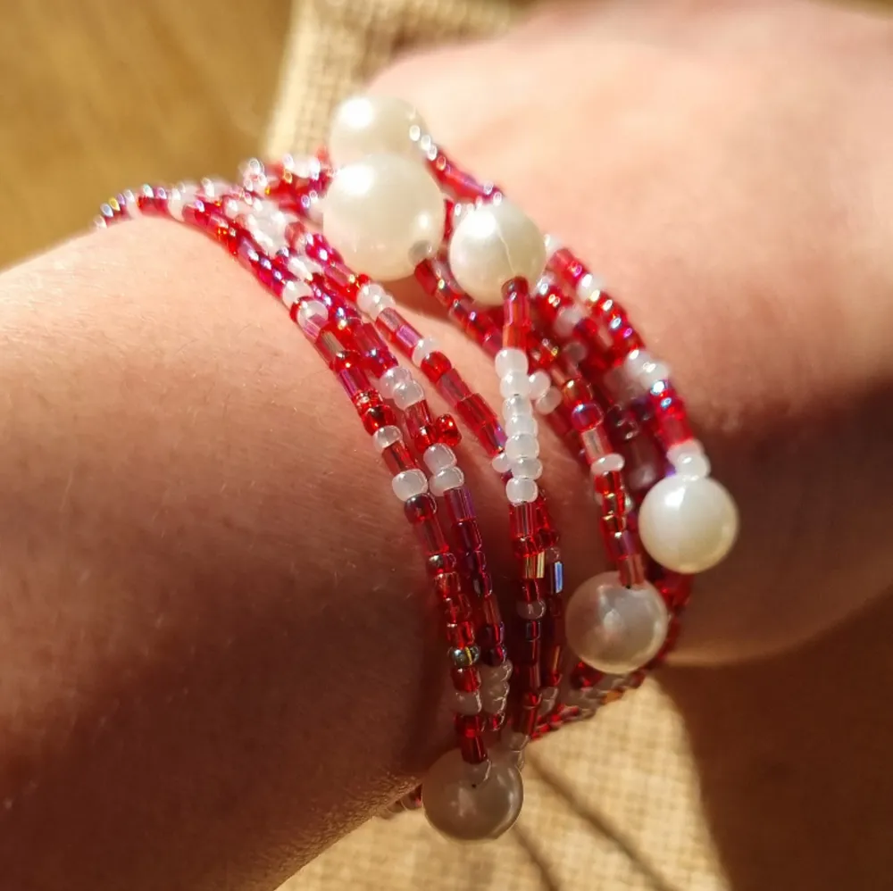 Mix acrylic white pearls and red glass beads, in a long fashion necklace. Long strand of mix beads and pearls that can signify your uniqueness and express yourself in style.   Handmade/Handcrafted.  3way fashion accessory necklace,bracelet and anklet. Accessoarer.