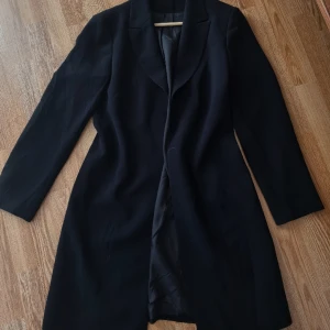 Tunn kappa - Perfekt till våren.