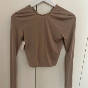 Nly topp - Fin oanvänd topp från Nelly. 