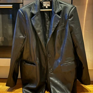 Oversized skinkavaj - Fint skick aldrig använd 